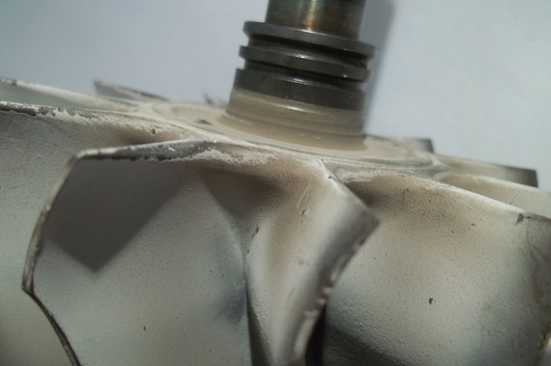 Turbine Shaft & Wheel Worn Piston Ring Seal Groove (a) AET Turbos